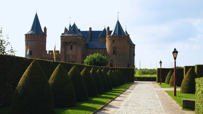 prime tours luxury travel destinations historic places and castles Benelux Muiden – Muiderslot Castle Photo by RE Walsh on Unsplash